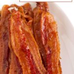 Oven-baked bacon with text overlay