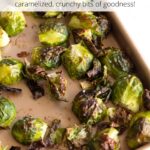 Roasted brussels sprouts on a sheet pan with text overlay.