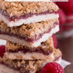 Stacked Raspberry Crumble Bars with text overlay