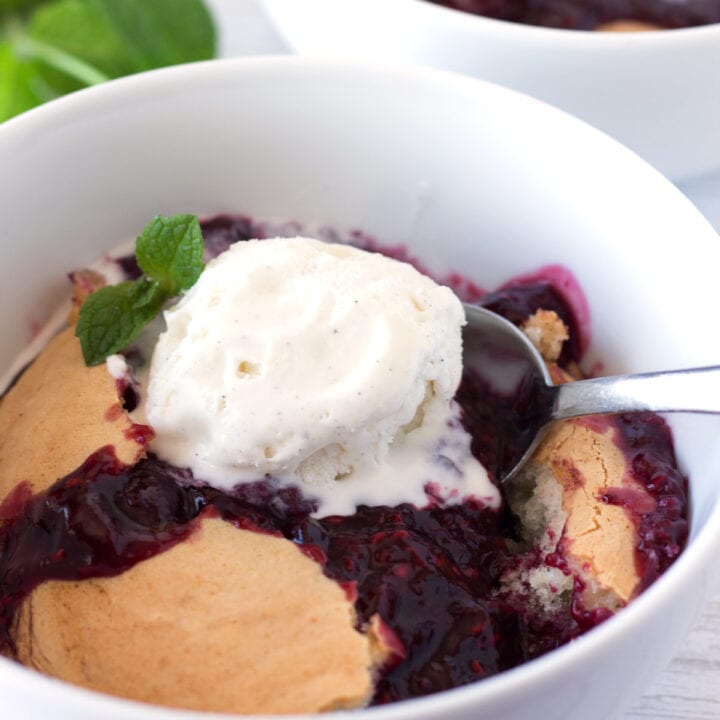 Easy berry cobbler and ice cream on a spoon.
