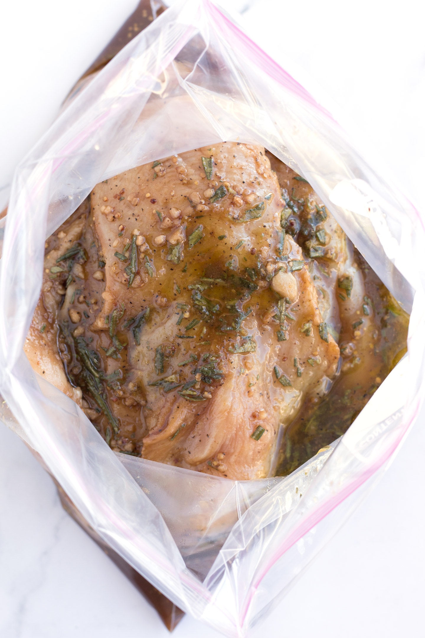 Chicken and Best Ever Chicken Grilled Chicken Marinade in zipbag.