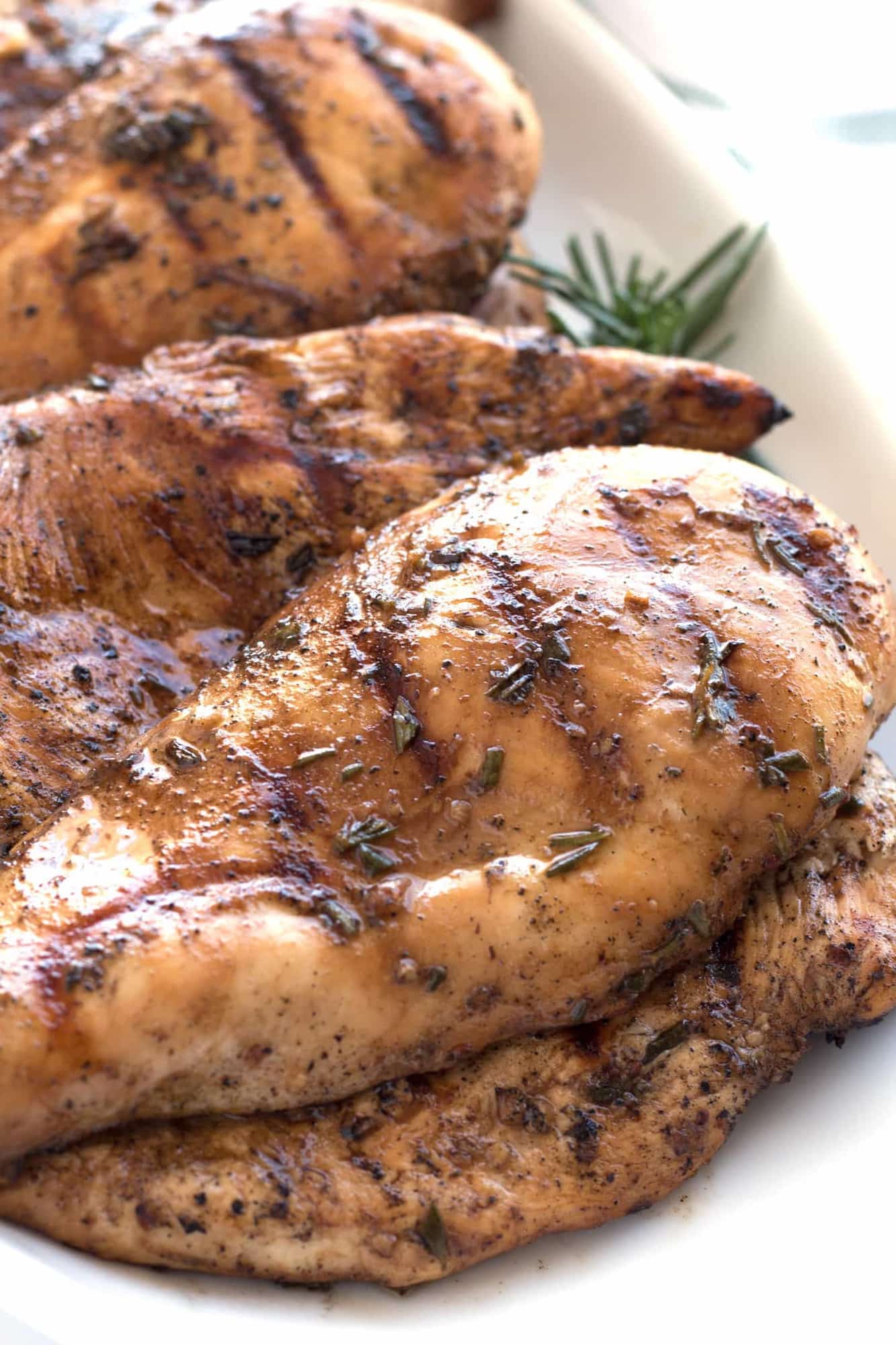 Grilled chicken close-up on tray.