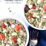 Greek Quinoa Salad in bowls with text overlay.