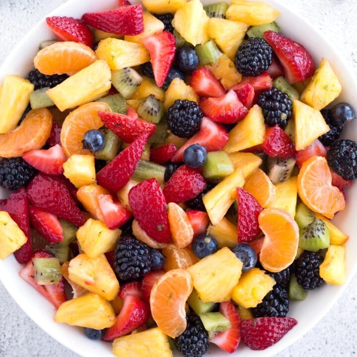 Bowl of fruit salad with honey lime dressing