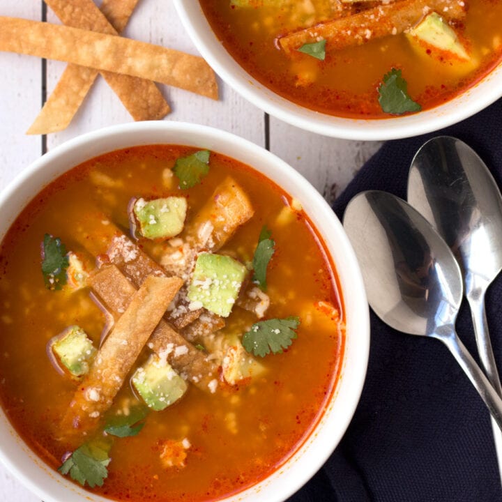 Bowl of Chicken Tortilla Soup with spoons