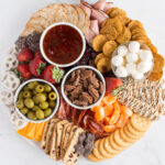 Full Sweet and Salty Snack Board with Christmas snacks.
