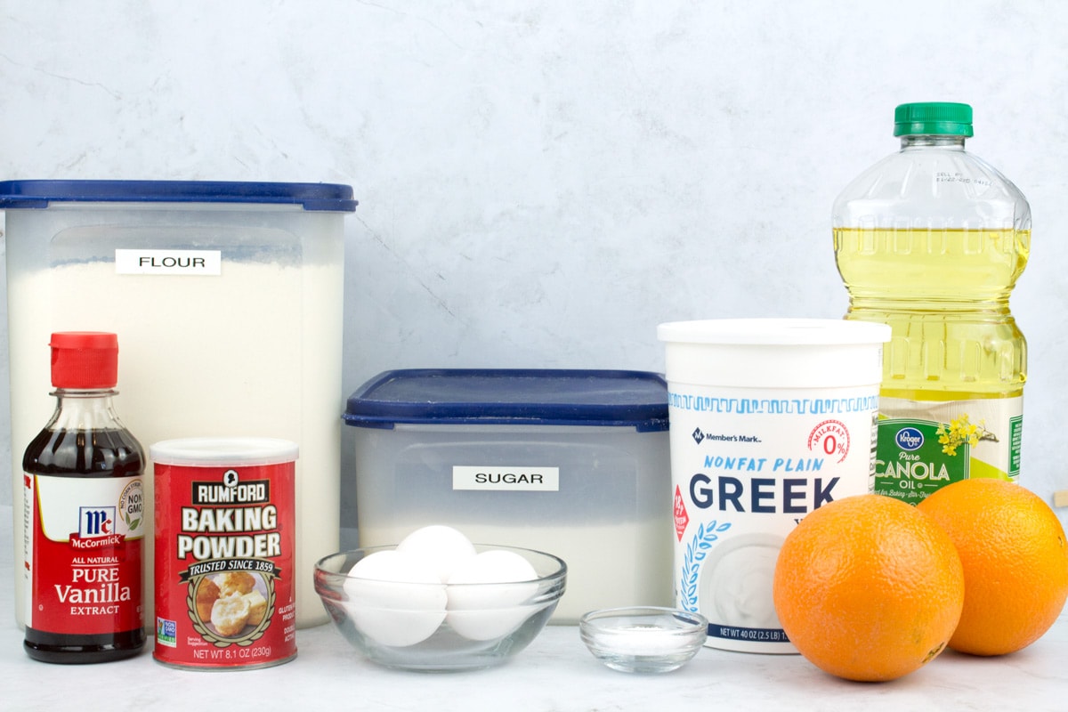 Ingredients for yogurt and oil loaf cake on counter.