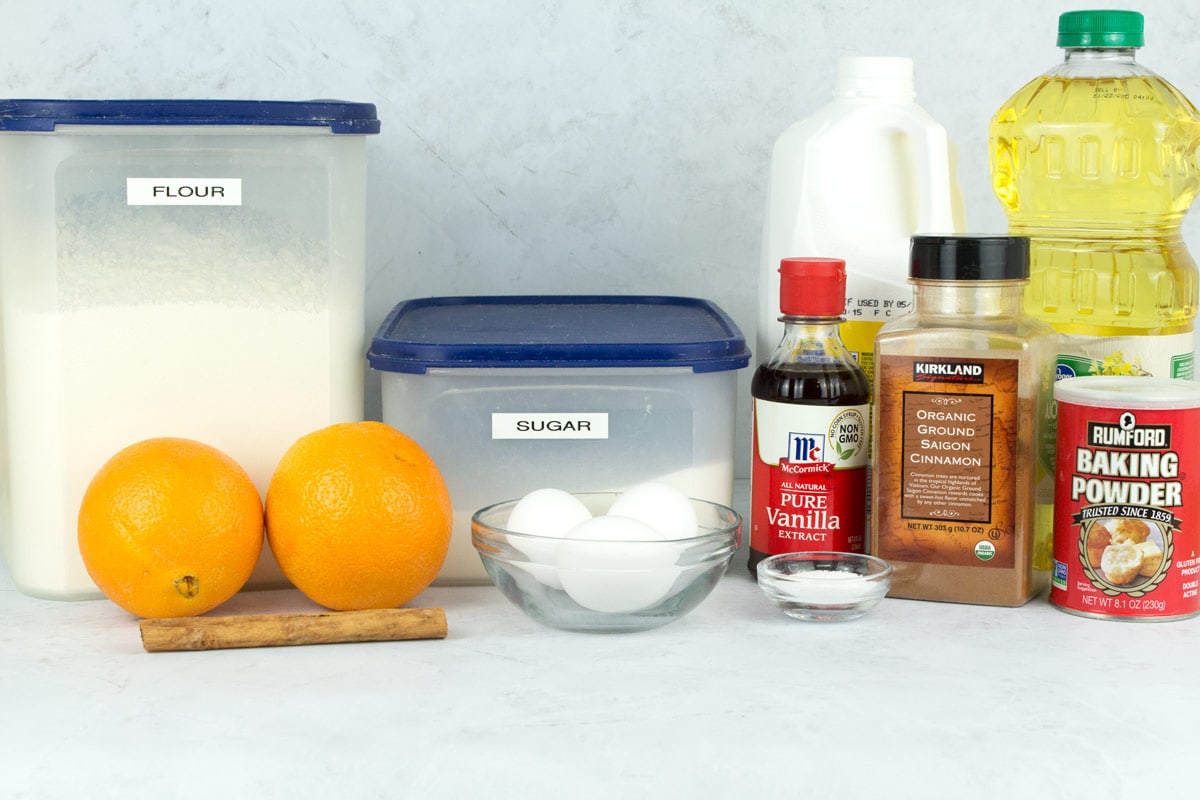 Ingredients for the cake and syrup on a counter.