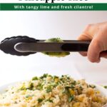 Hand squeezing a lime with tongs over a bowl of pineapple lime rice with text overlay on top.