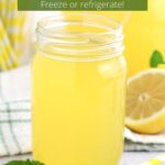 Clear glass jar of yellow lemonade concentrate with text overlay on top of photo.
