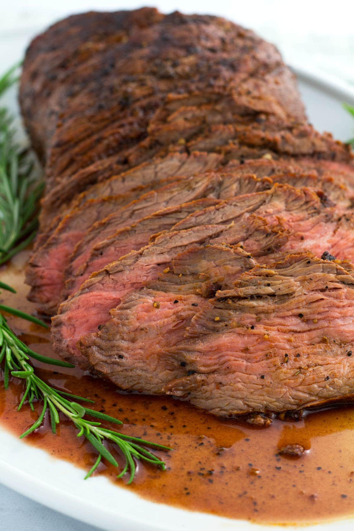 Juicy, tender smoked tri-tip sliced and ready to serve.