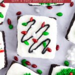 Christmas lights brownie on parchment paper with scattered sprinkles and text overlay.