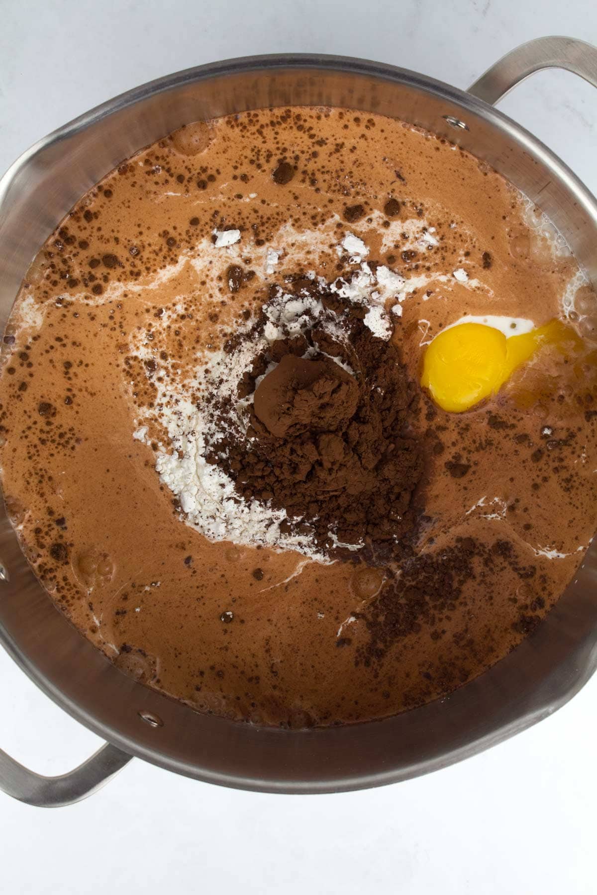 Chocolate Peanut Butter Pie filling in a medium pot.