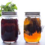 Two jars of iced tea concentrate side by side.