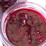 Jars of cake filling with graphic overlay.