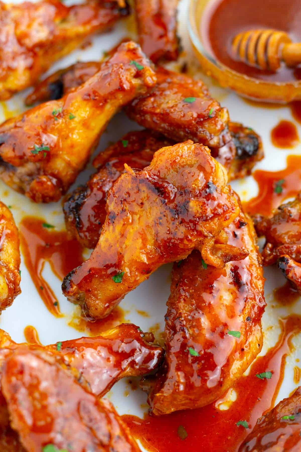 Flavorful hot honey drizzled over crispy chicken wings.