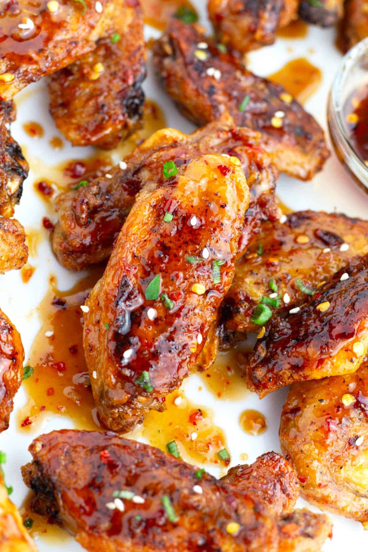 Slightly spicy sweet chili wings sprinkled with sesame seeds.