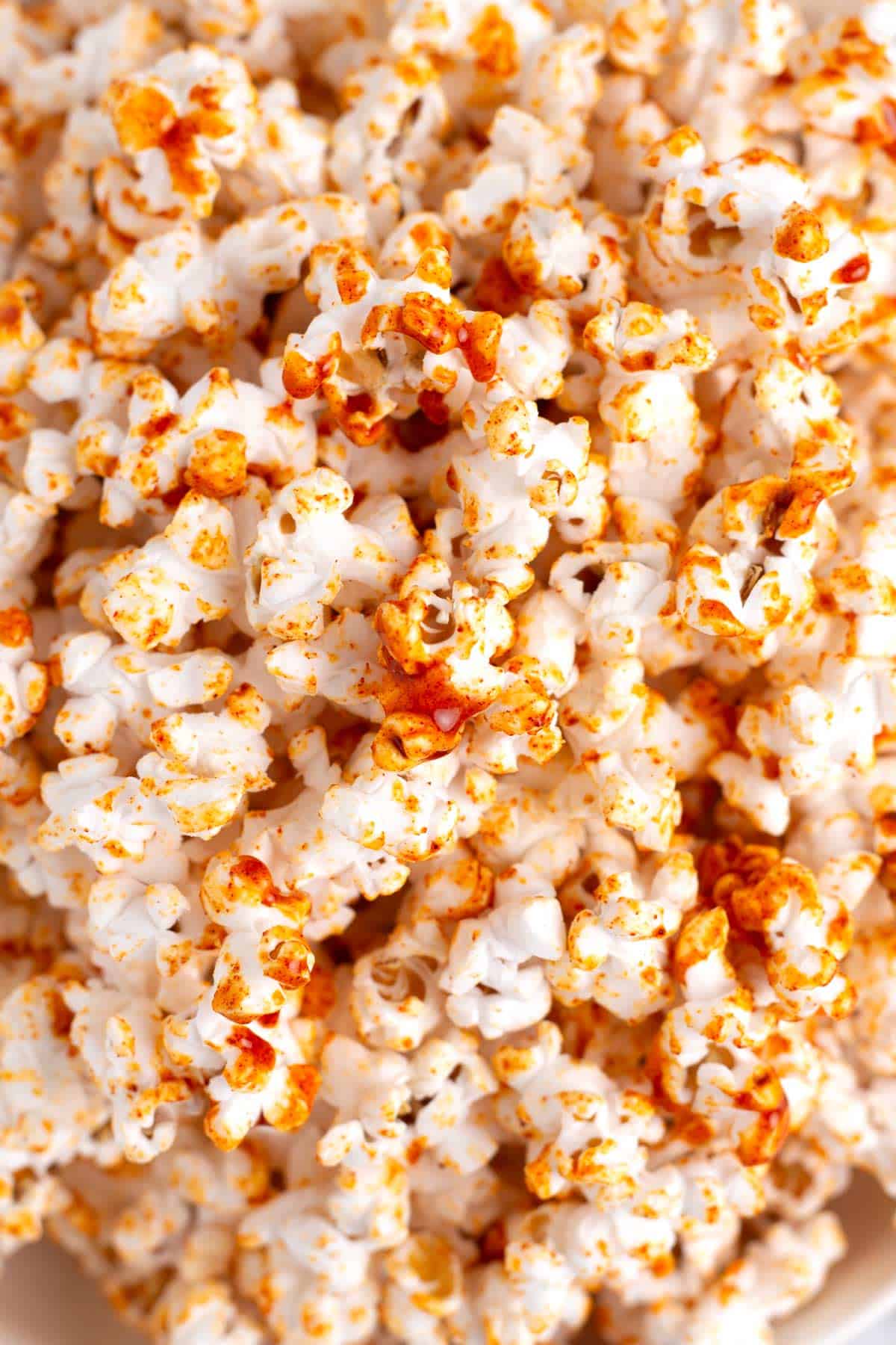 Spicy honey sauce caramelized on popcorn pieces.