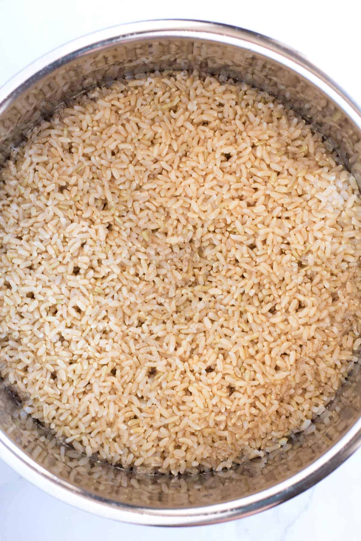 Finished cooked brown rice in a pot.