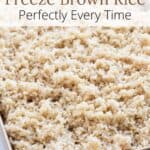 Brown rice on sheet pan with words overlayed for Pinterest.