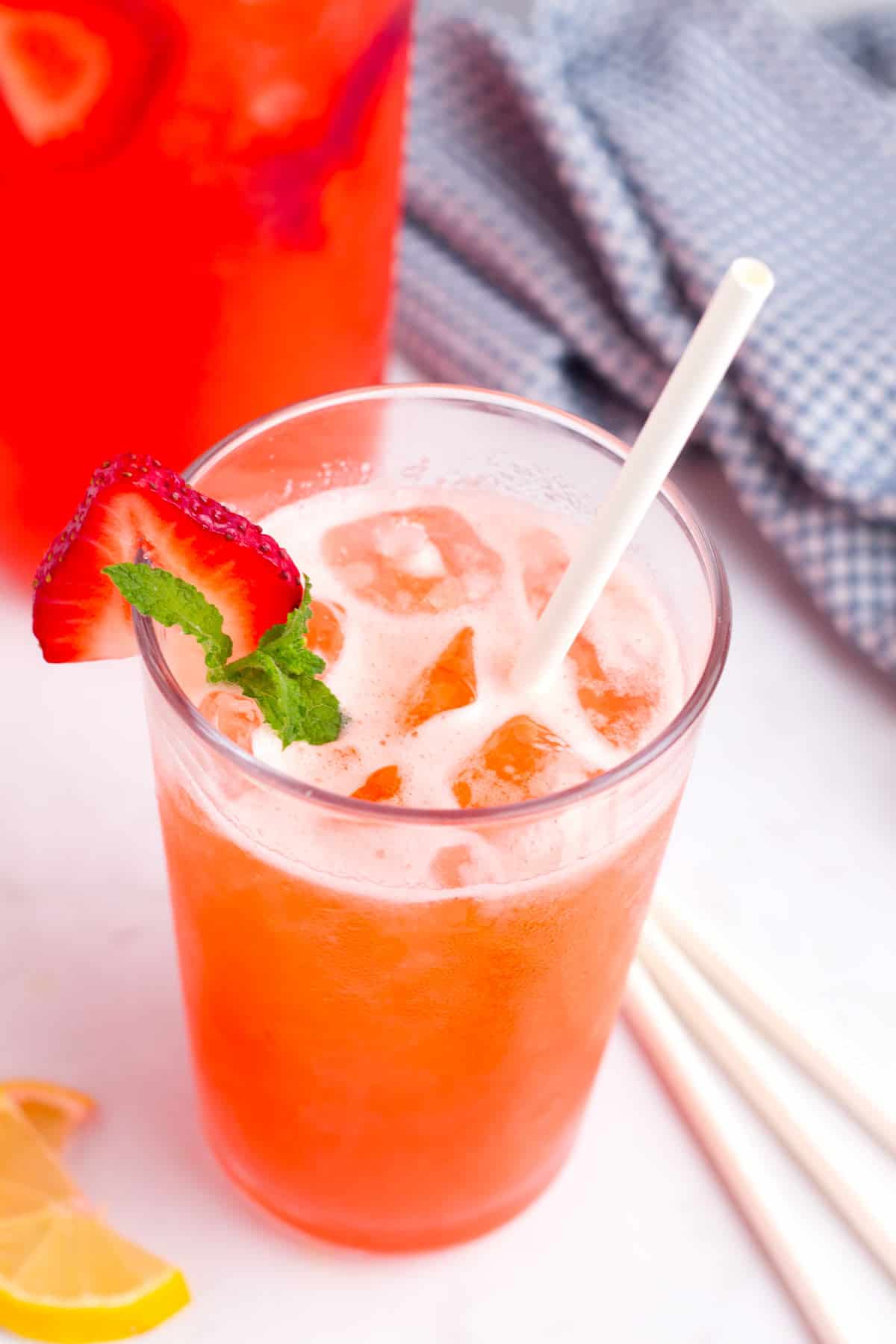 Overhead view of refreshing summer lemon berry beverage.