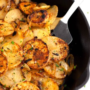 Easy Skillet Fried Potatoes golden and crispy seasoned with pantry staples.