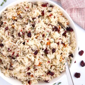 Rice seasoned with cranberries, fresh thyme, and pecans.