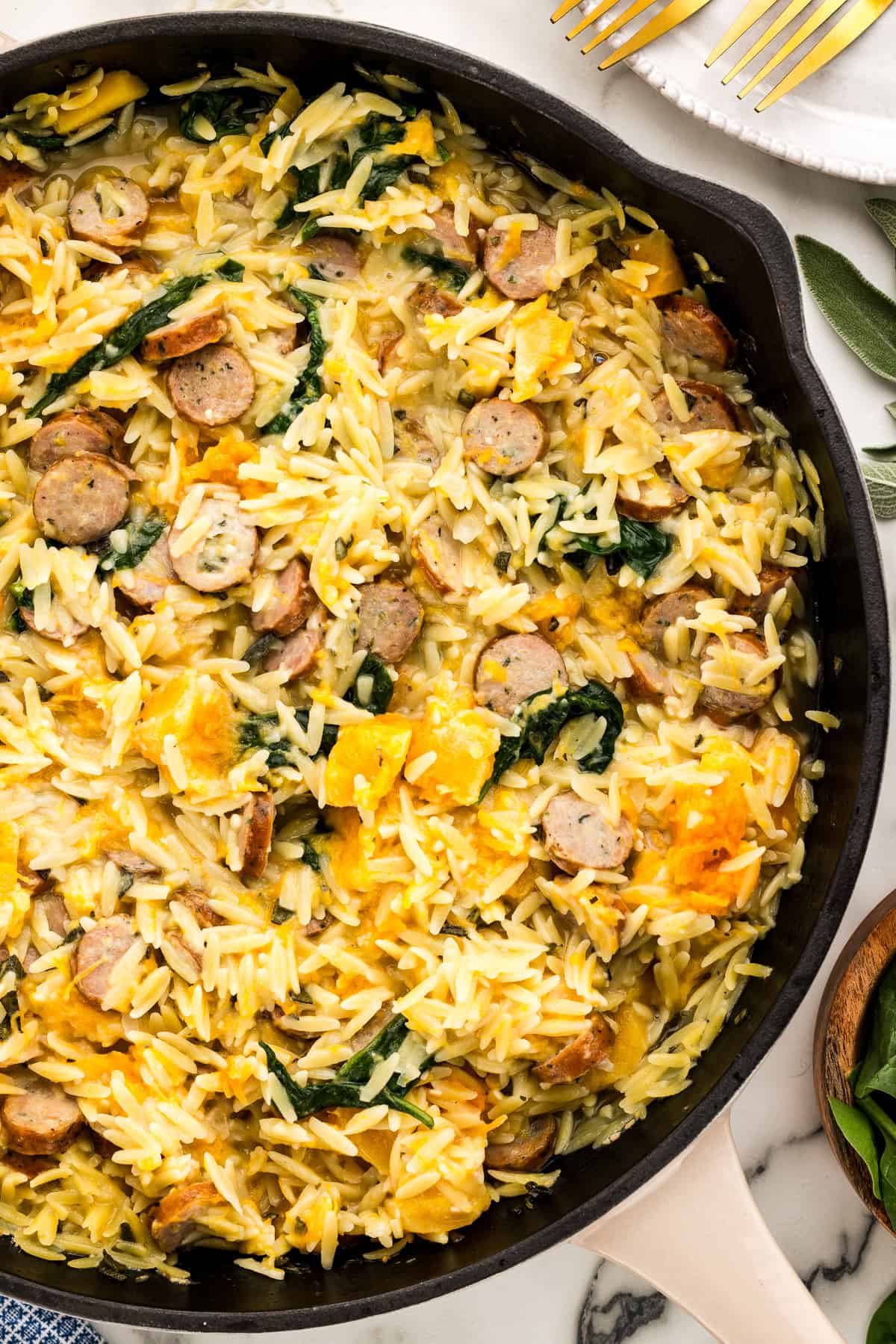 Chicken sausage, butternut squash, and sage in one pan dinner.