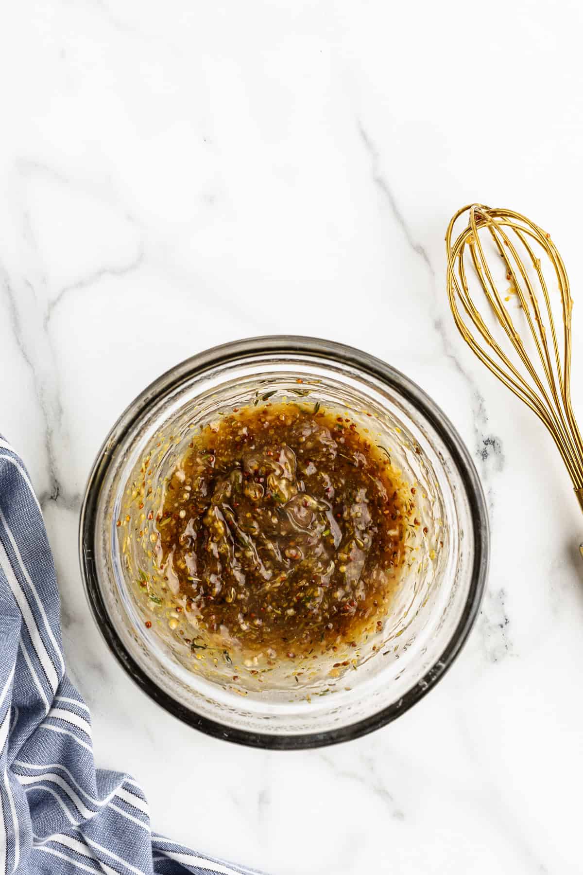 Sweet and savory maple sauce in glass bowl.