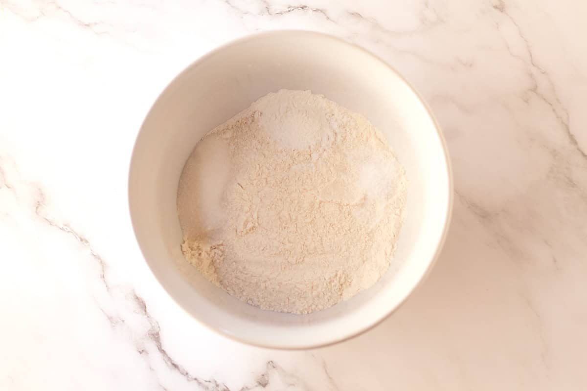 Mixing dry ingredients in a bowl.