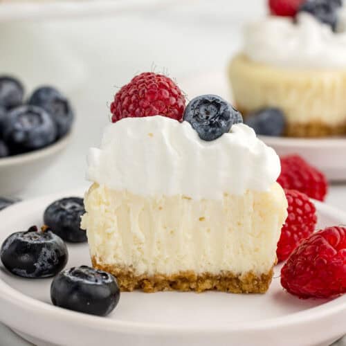 Muffin tin baked cheesecakes made of graham cracker base and creamy cheesecake filling.