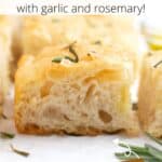 A piece of focaccia with rosemary and garlic with a graphic overlay of text.
