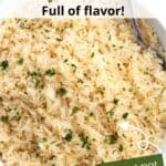 A serving of garlic rice topped with herbs with a graphic overlay.