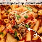 A spoonful of pasta and sausage over a large pot with red text overlaid.