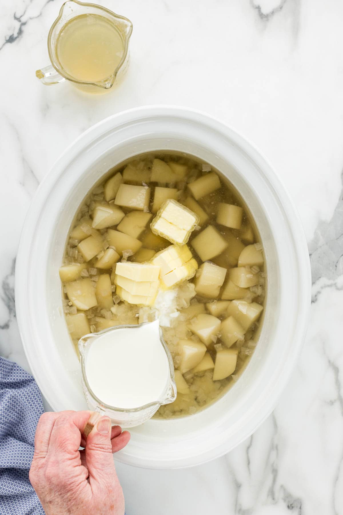 Adding in the butter and milk before zooming.