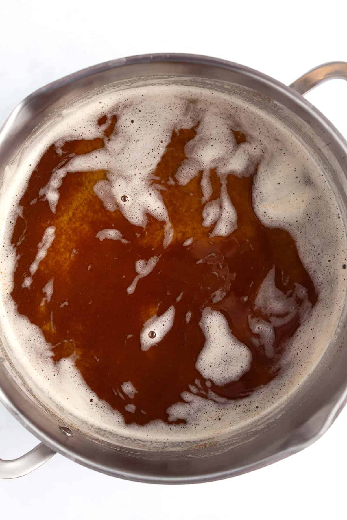 A large pot of swirling brown butter.