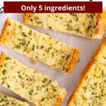 Pieces of garlic bread on parchment with a graphic overlay.