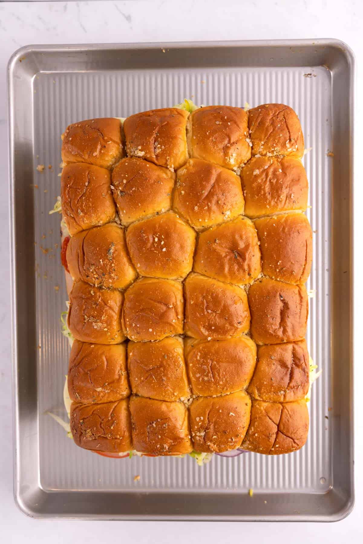 Italian sliders completed on a sheet pan.