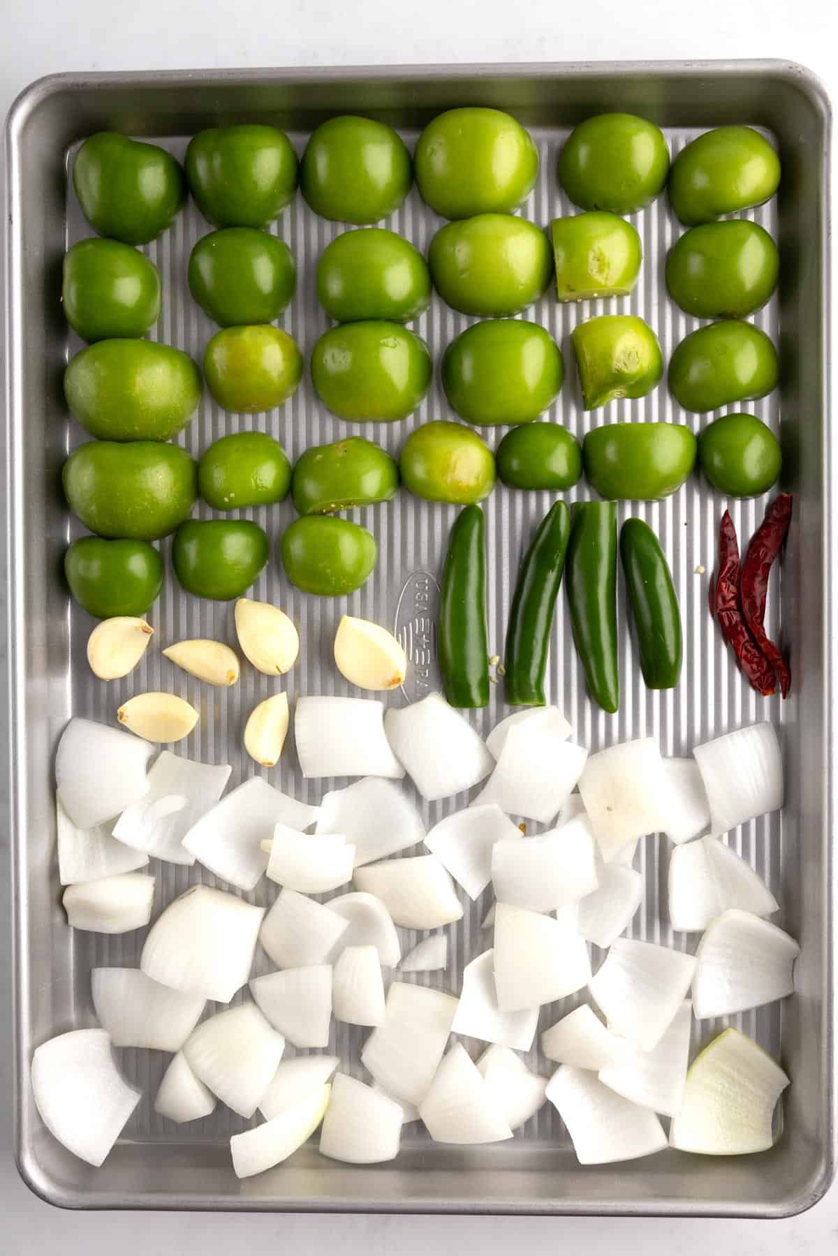 A sheet pan of raw vegetables.