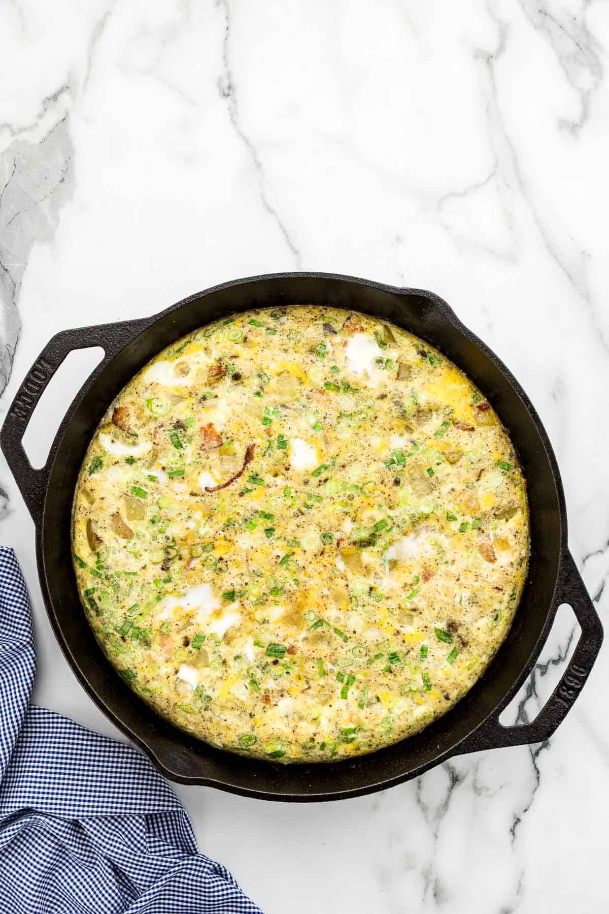 A breakfast bake in a cast iron skillet.