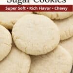 Closeup of a pile of sugar cookies on a wire rack with a graphic overlay.