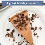 A slice of chocolate cheesecake on a white plate with a graphic overlay.