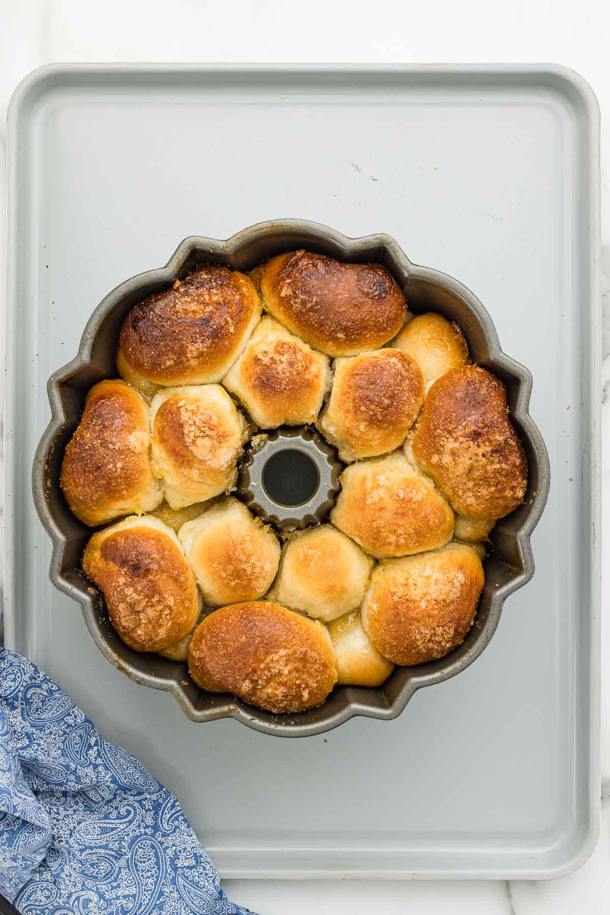 Bread baked golden in a bundt pan.
