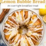 Lemon monkey bread on a serving dish topped with glaze and lemon zest with a graphic overlay.