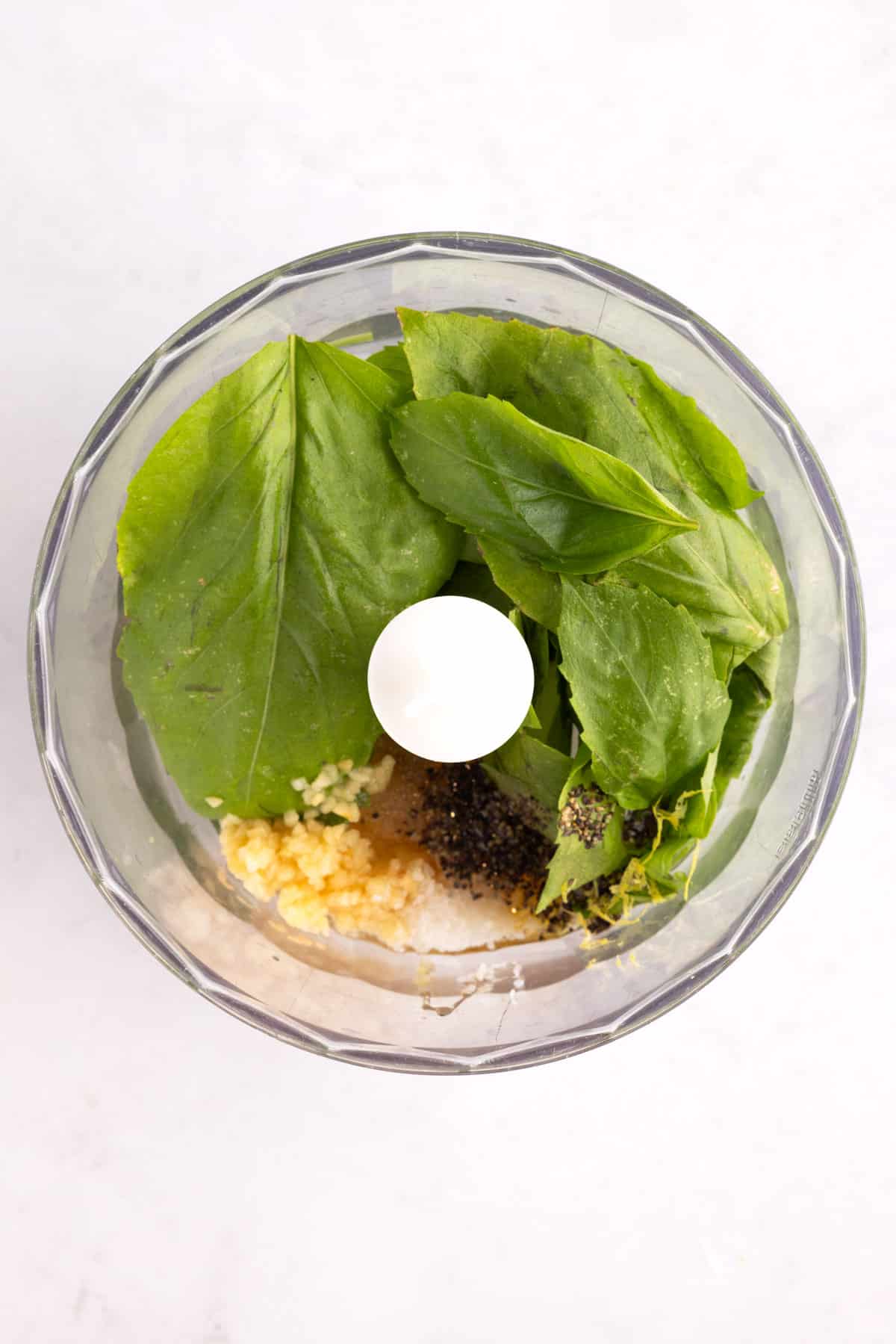 Dressing ingredients in a food processor.