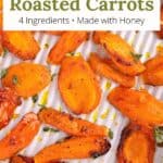 Honey roasted carrots scattered on a sheet pan with a graphic overlay.