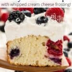 A square of berry cake sitting on a wood spatula with an overlay of text.