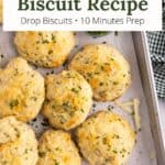 A pan of biscuits stacked in a cluster with a graphic overlay.