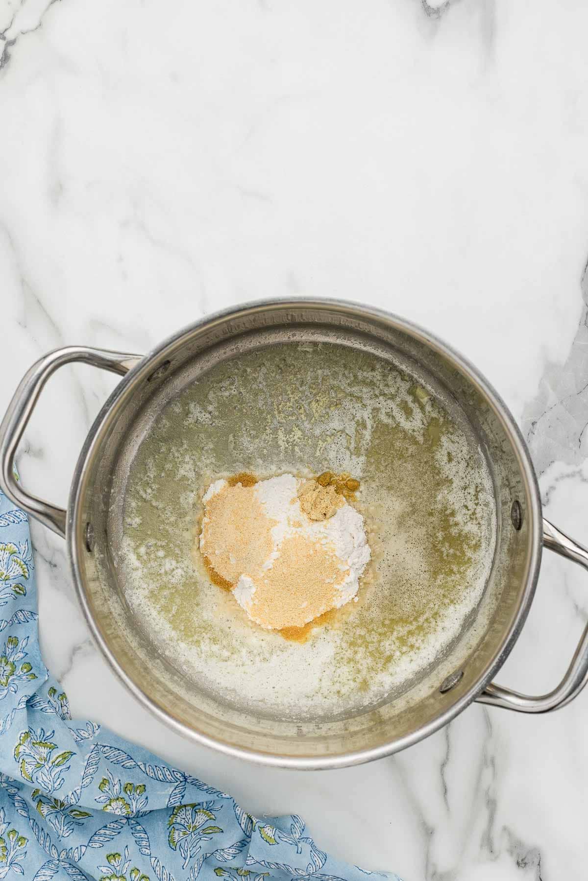 Ingredients combined in a cooking pot.