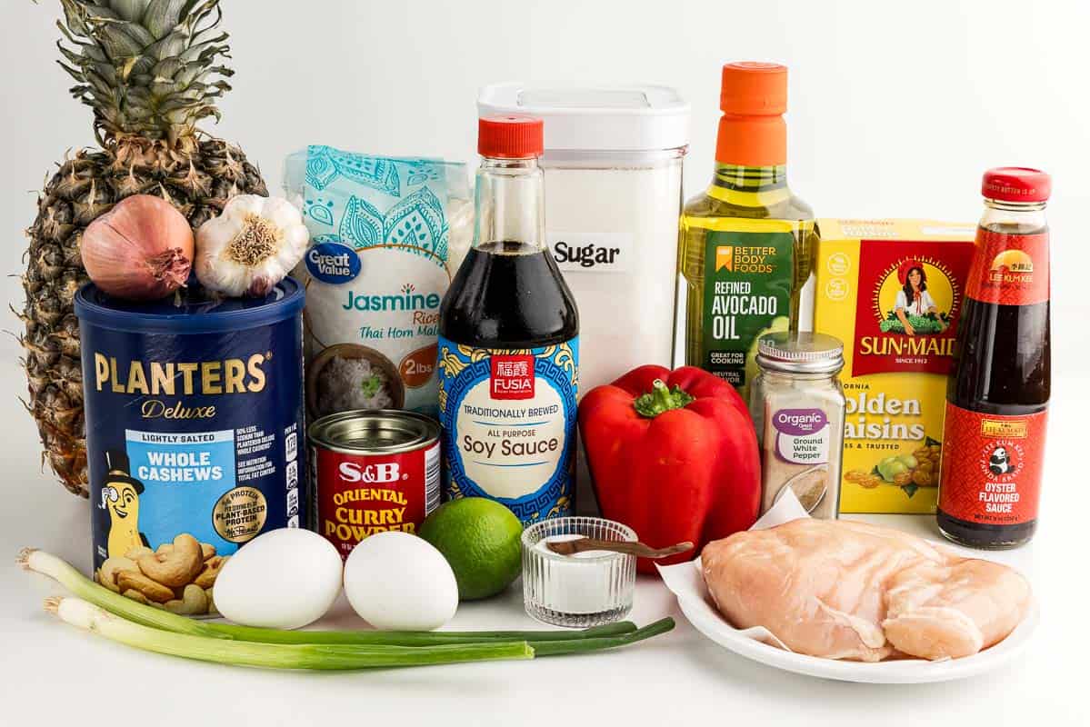 Pineapple fried rice ingredients on a white countertop.